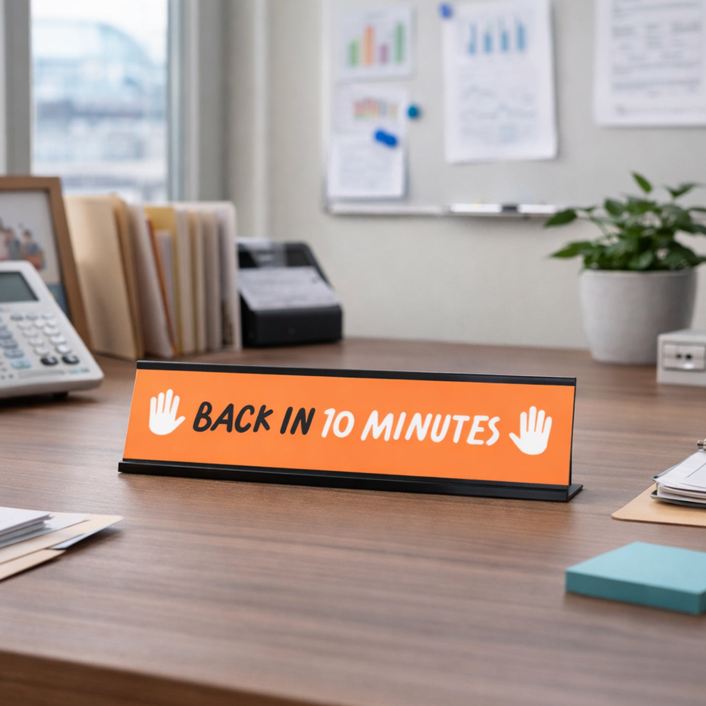 Back in 10 minutes, Orange and White Black Frame Desk Sign (2 x 8")