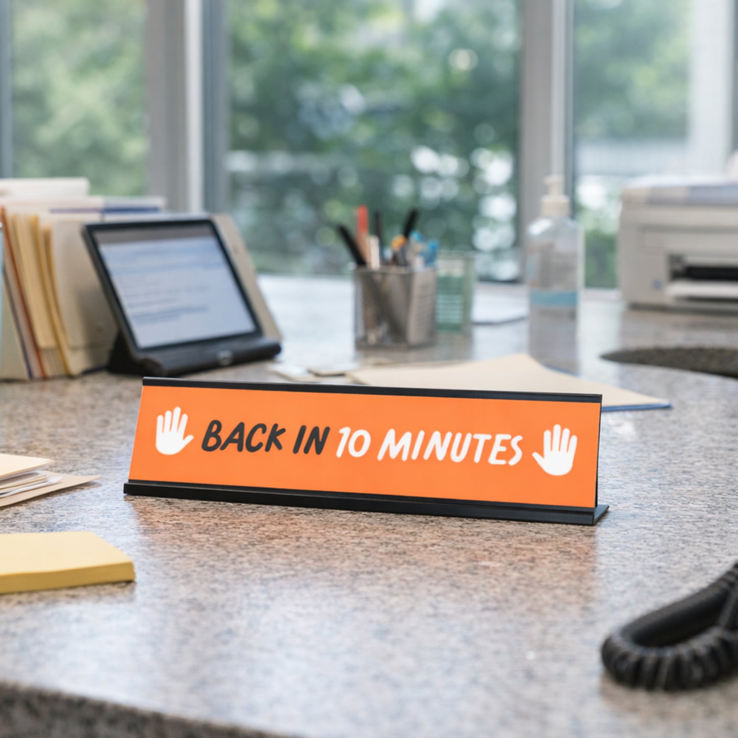 Back in 10 minutes, Orange and White Black Frame Desk Sign (2 x 8")
