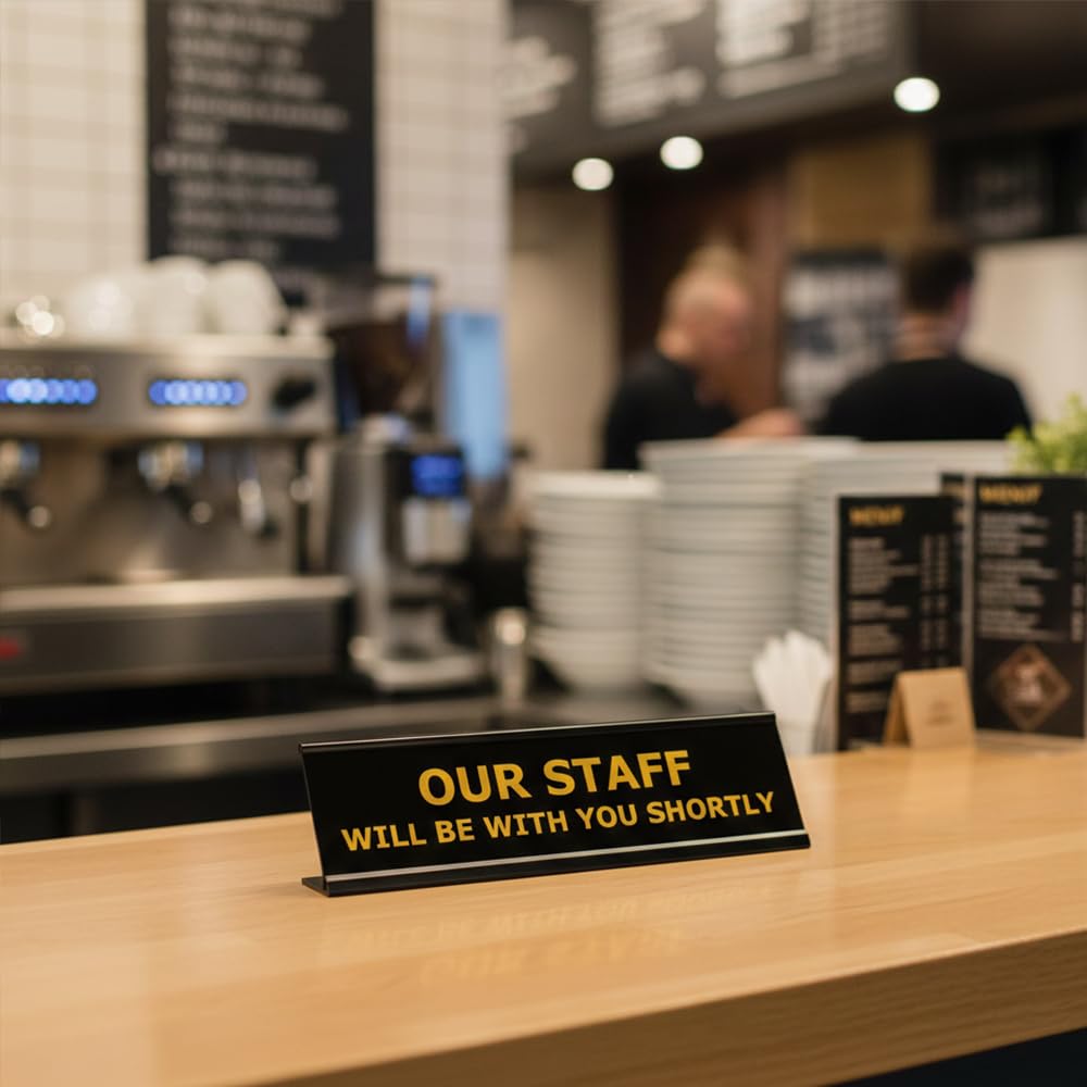 Our Staff Will Be With You Shortly, Black Frame, Desk Sign (2x8")