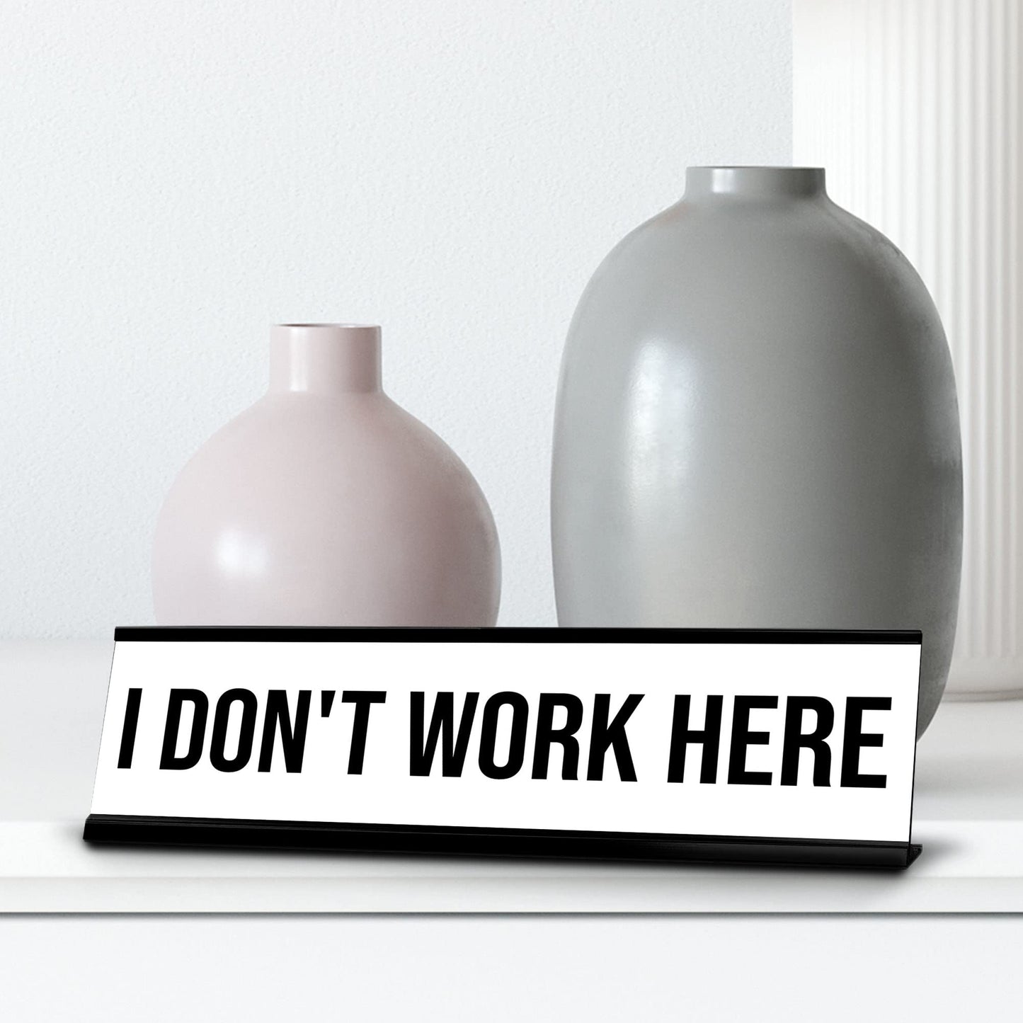 Signs ByLITA I Don't Work Here Black Frame Desk Sign (2x8“)