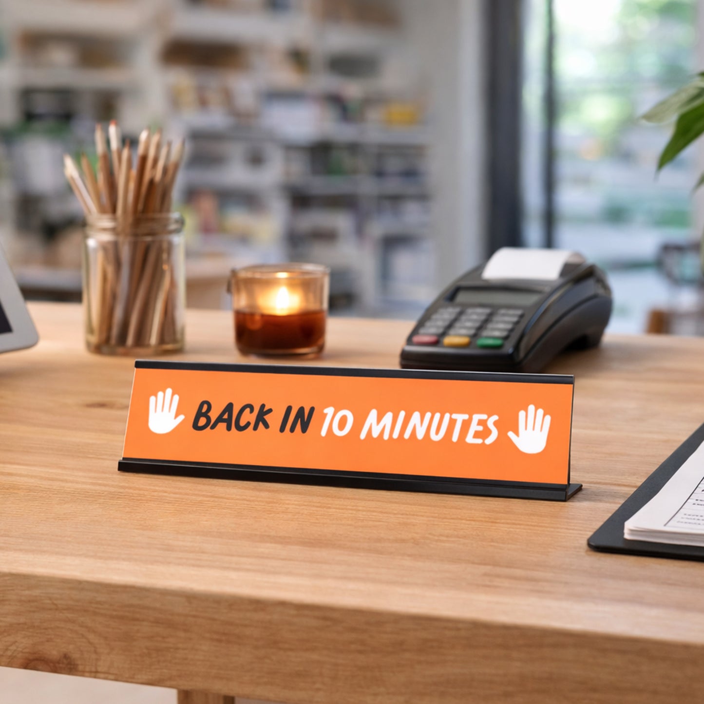 Back in 10 minutes, Orange and White Black Frame Desk Sign (2 x 8")
